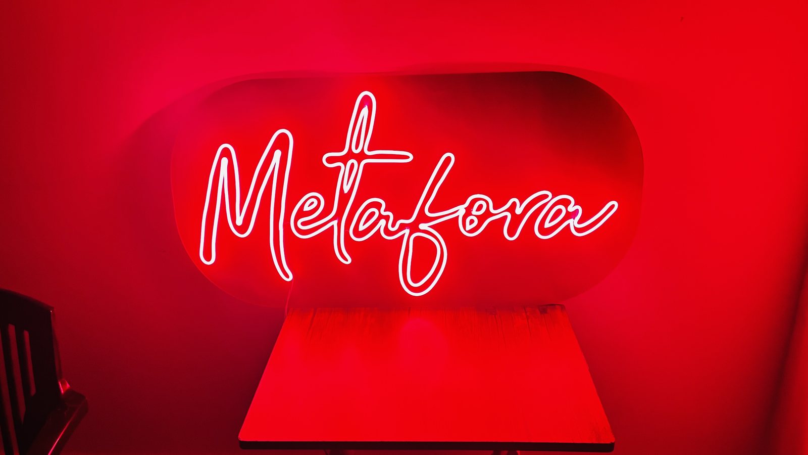 Metafora red neon sign installation